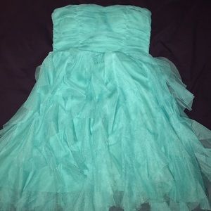 bright blue party dress looks more like teal