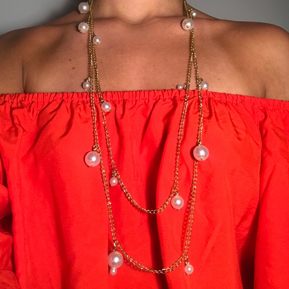 Long gold layered necklace with pearls