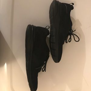 All black champion running shoes!