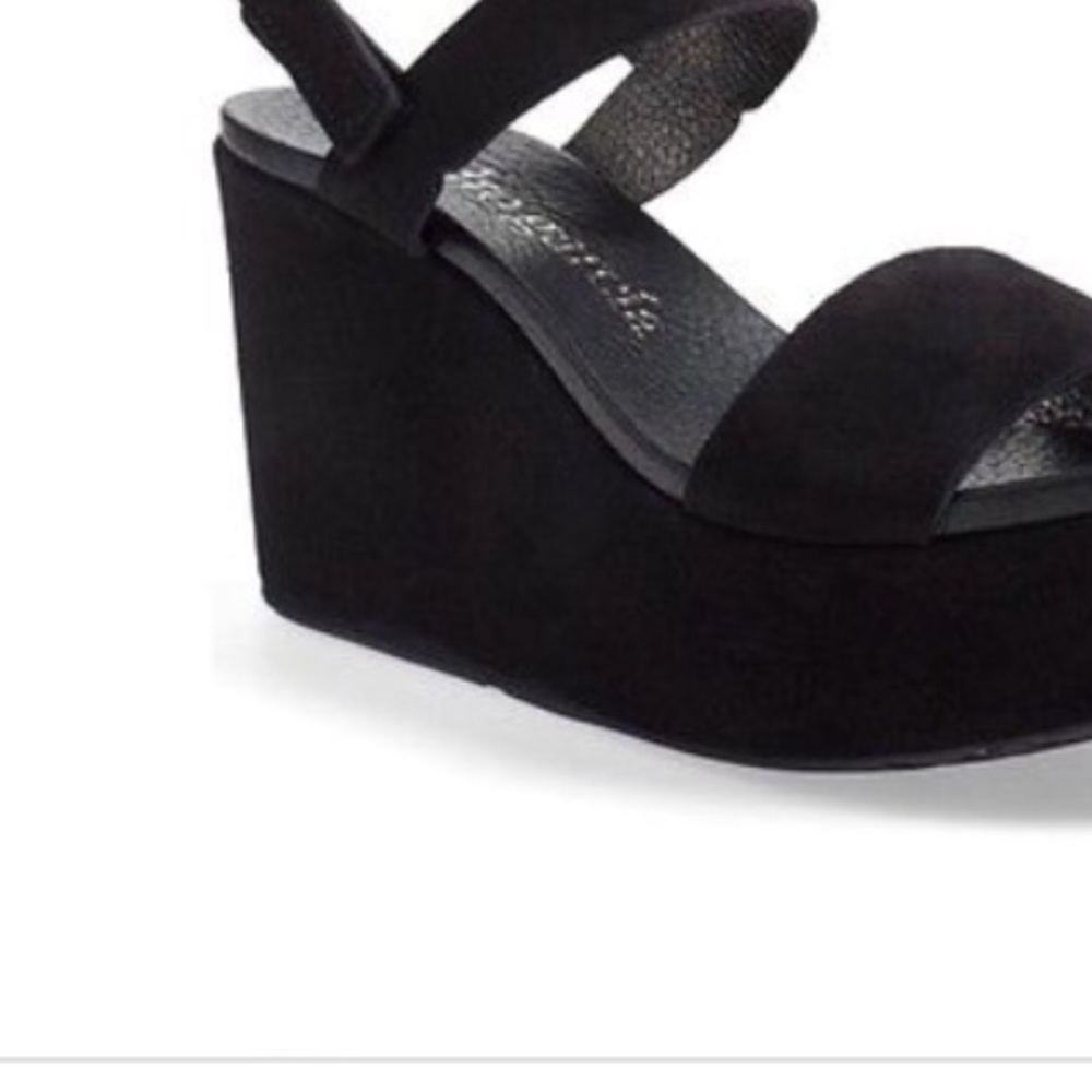 Pedro Garcia Dulce black platforms.