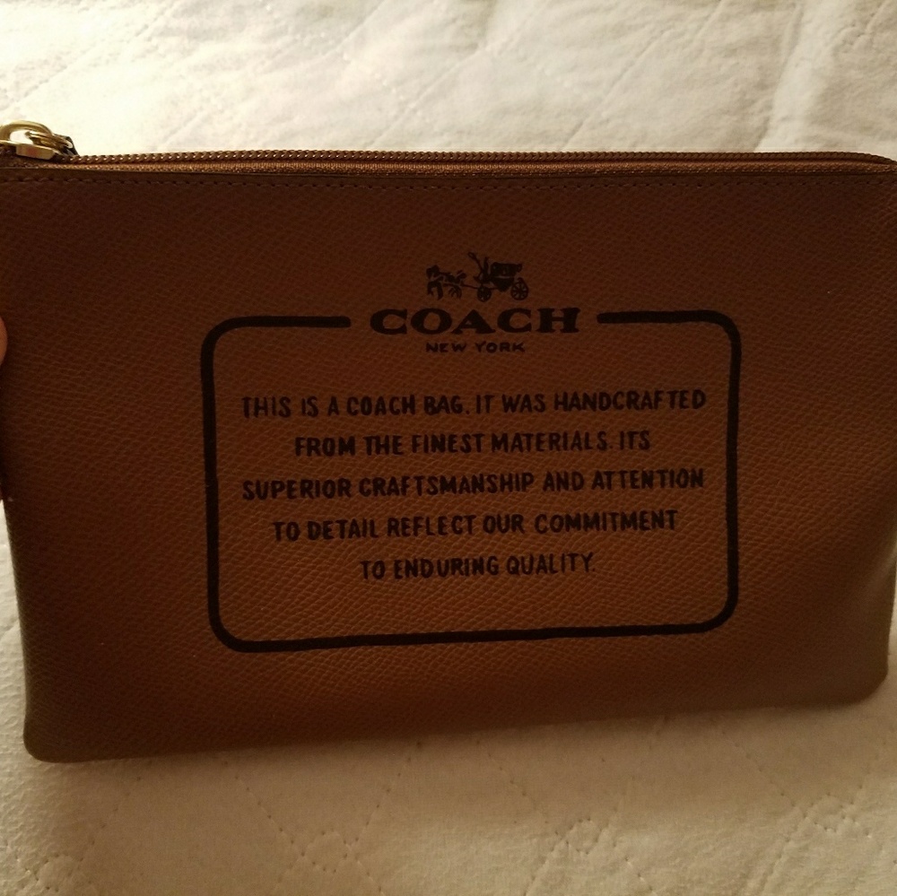 Aunthentic Coach wristlet