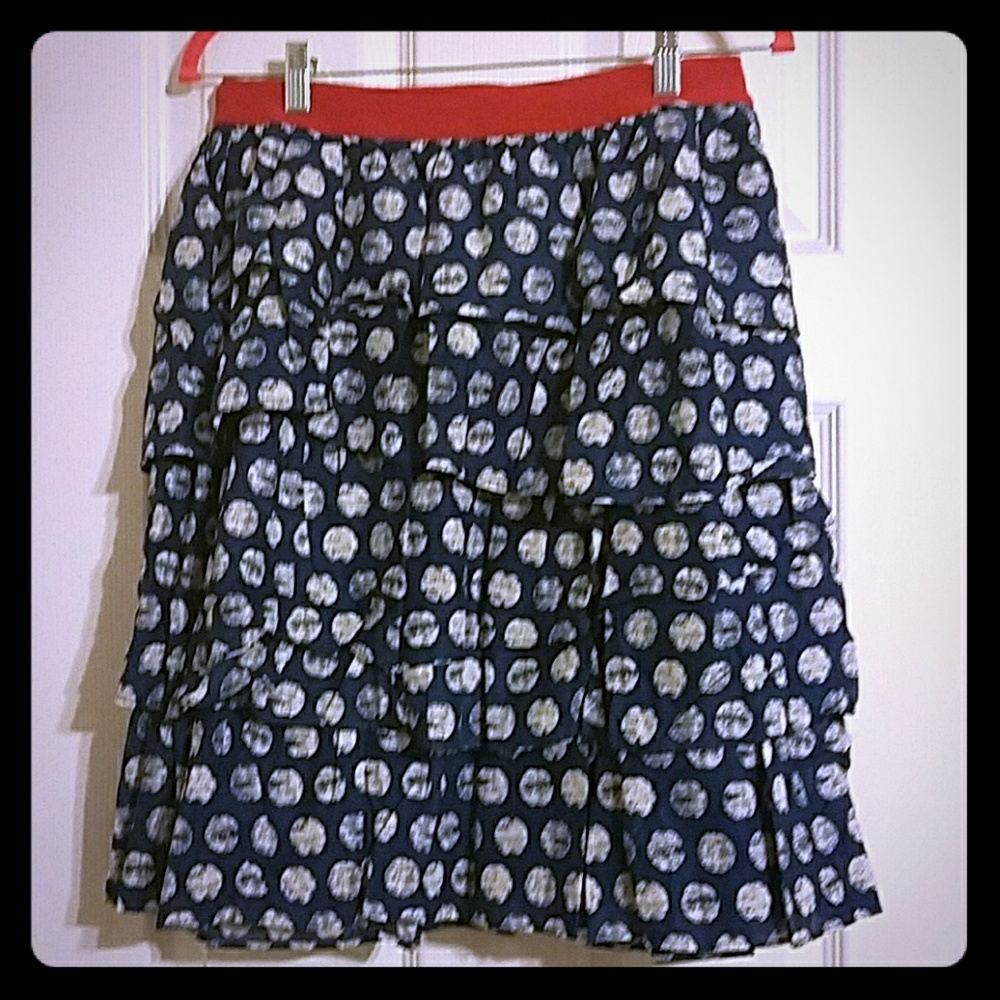 ^Navy polka dot skirt