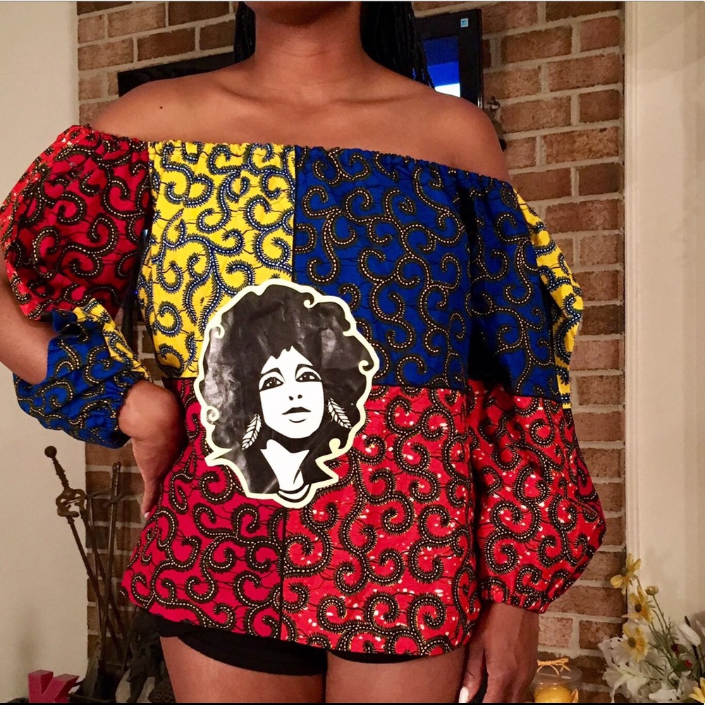 Blue, red, and yellow off the shoulder top