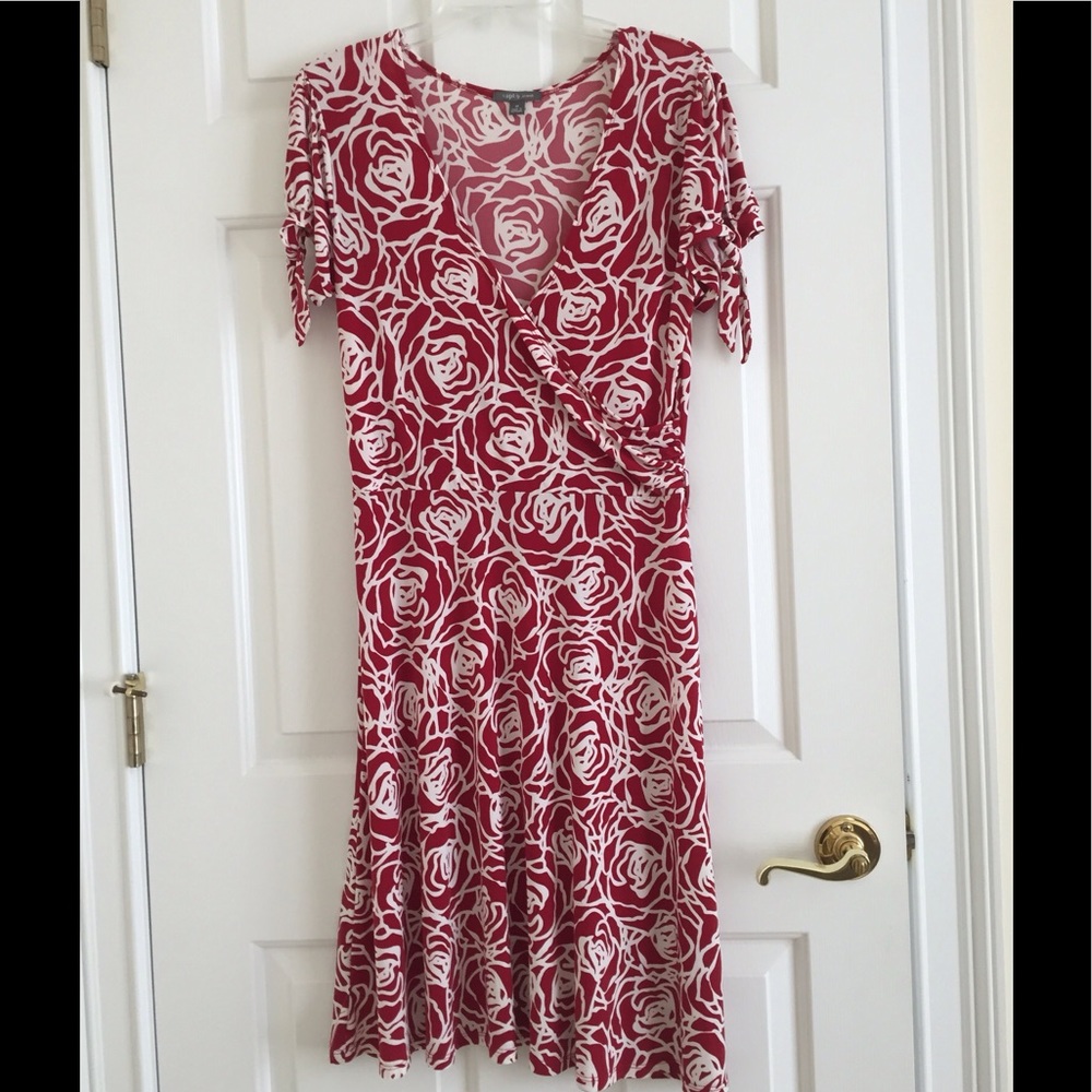 Pretty wrap look dress with tie belt.