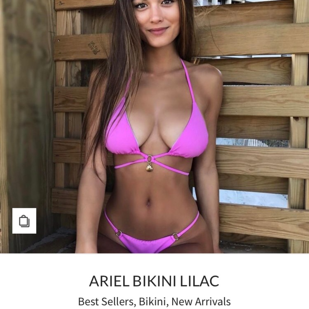 NWT. Plumeria Swimwear. Size Large but fits US 6-8