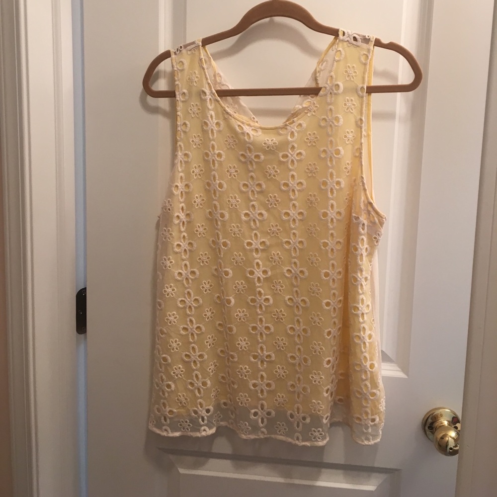 Sleeveless white and yellow top
