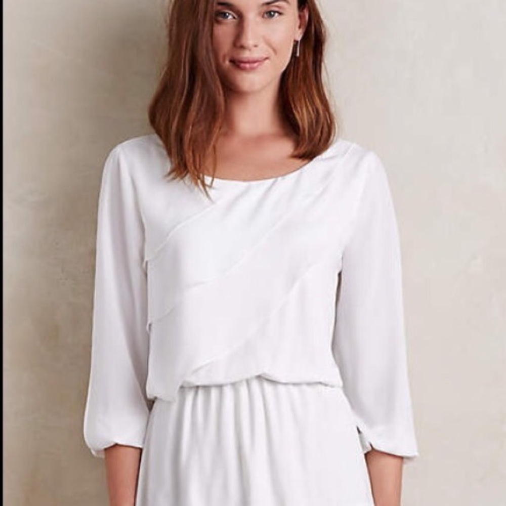 Deletta from Anthropologie white ruffle peplum top