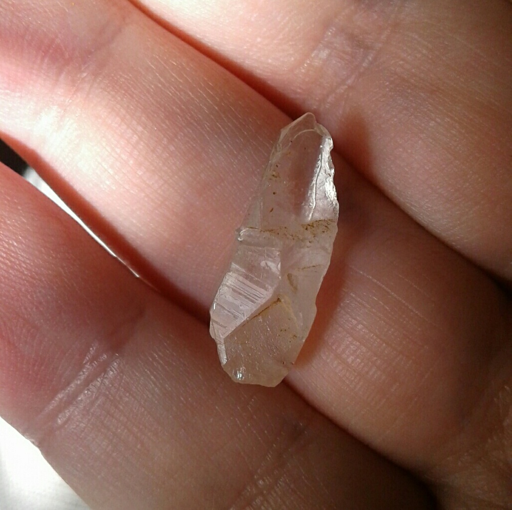 Peice of qaurtz part milky part clear very small