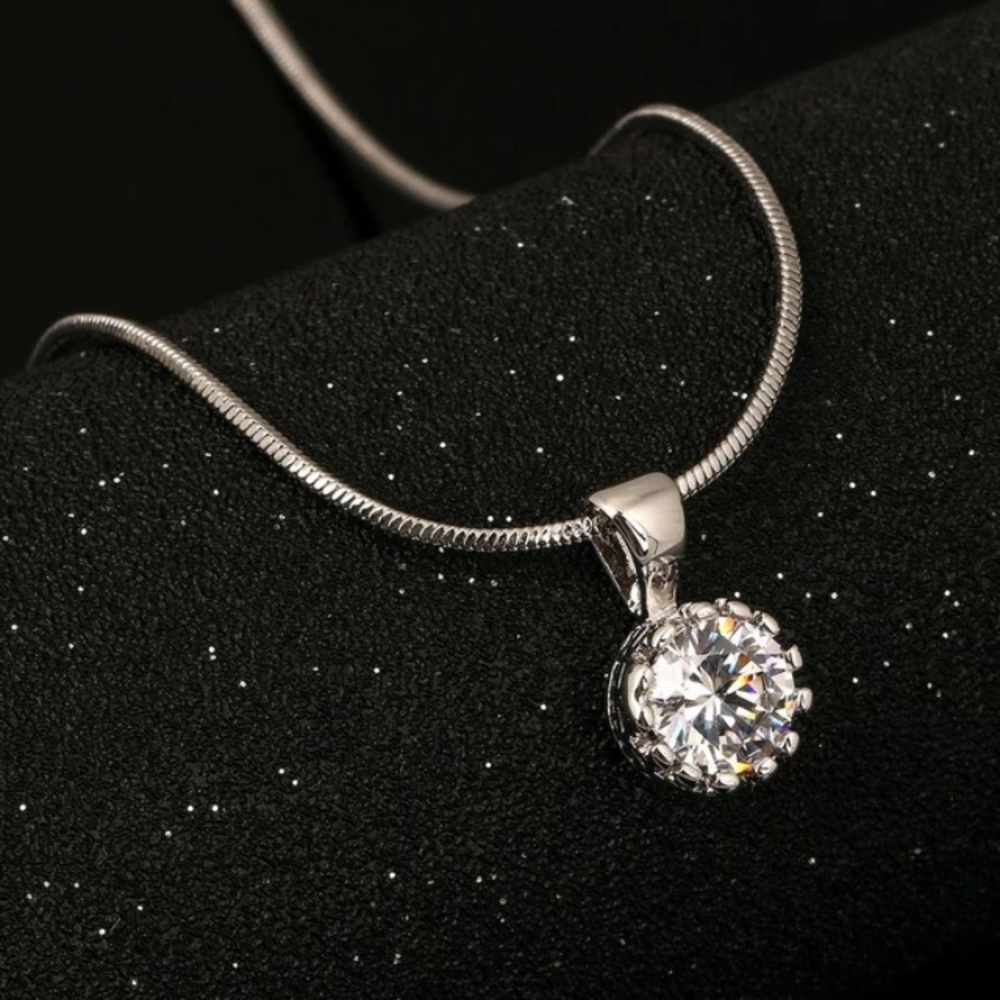Necklace with crown shaped pendant