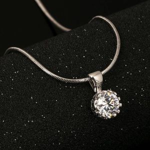 Necklace with crown shaped pendant