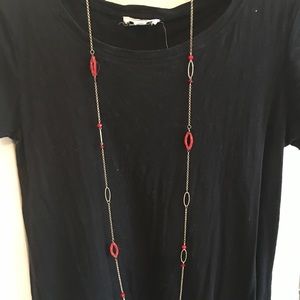 Long red and gold necklace