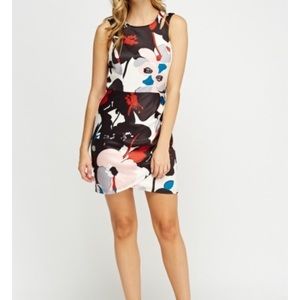 Brand new wrap floral print dress. Size small