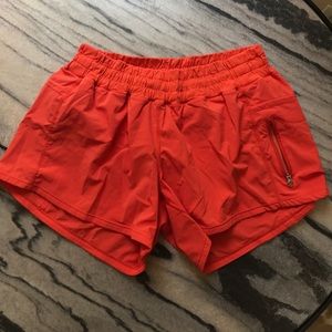Orange lululemon tracker shorts size 8