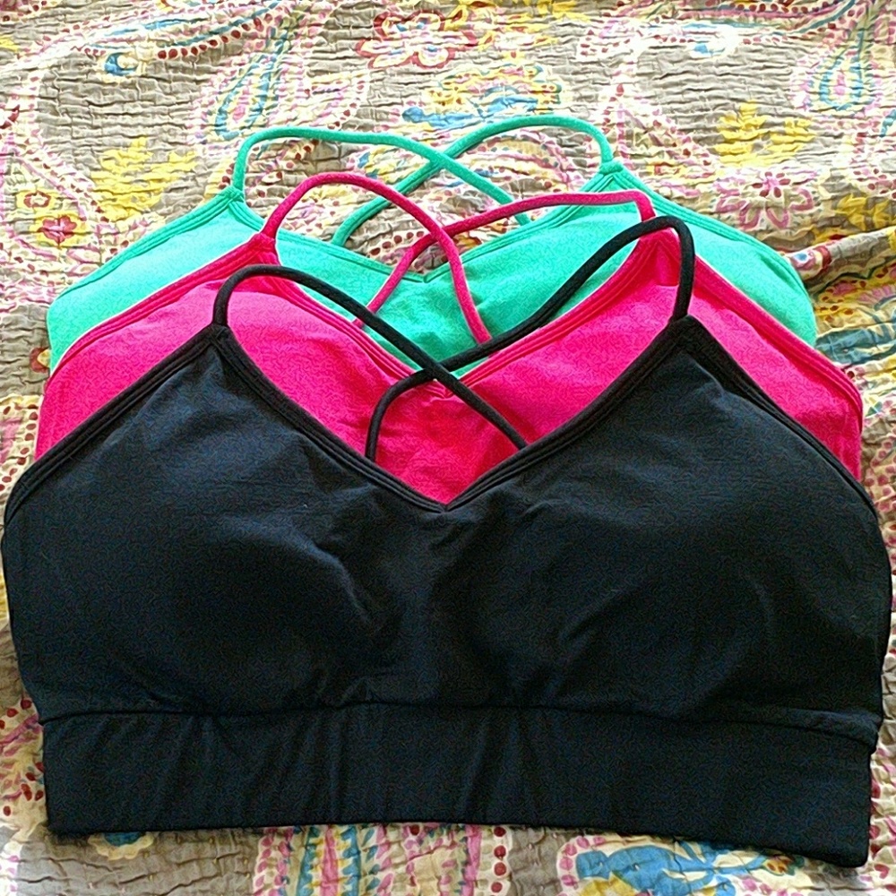Fabletics sports bra set of 3. Black, pink, green