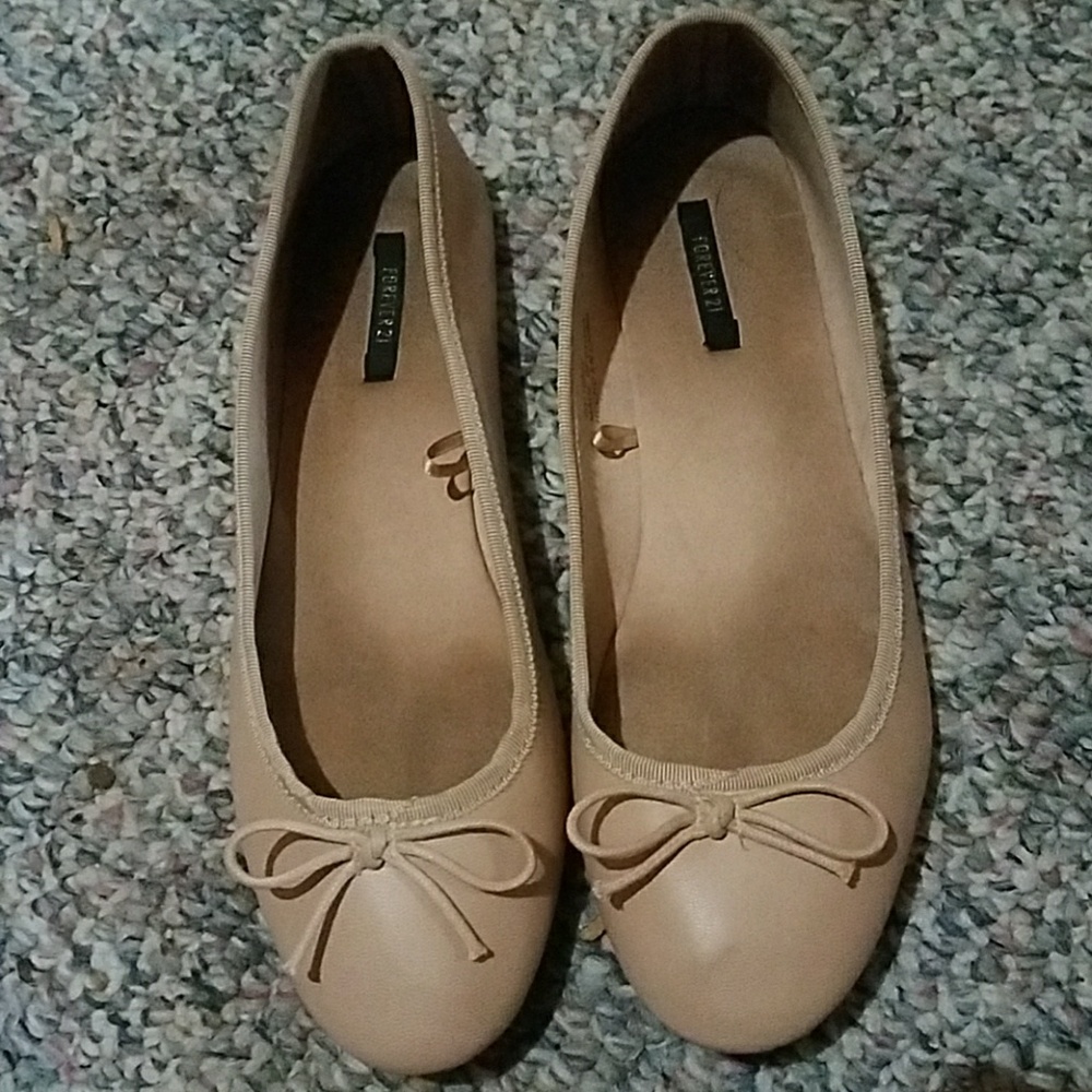 Nude flats.