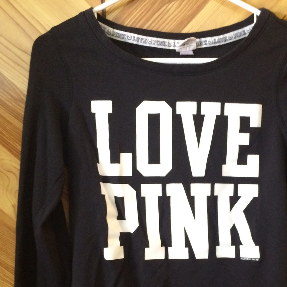 Pink sweatshirt and sports bra
