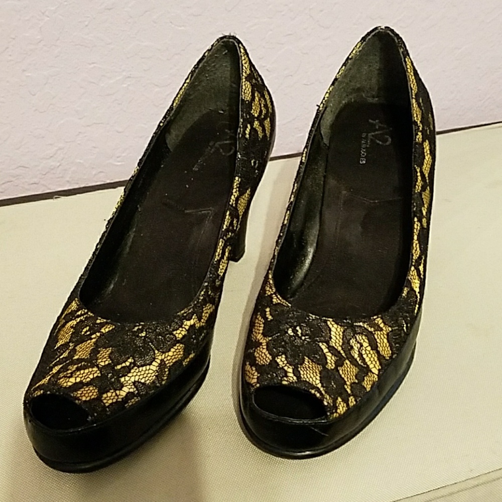 Leather and lace open toe pumps