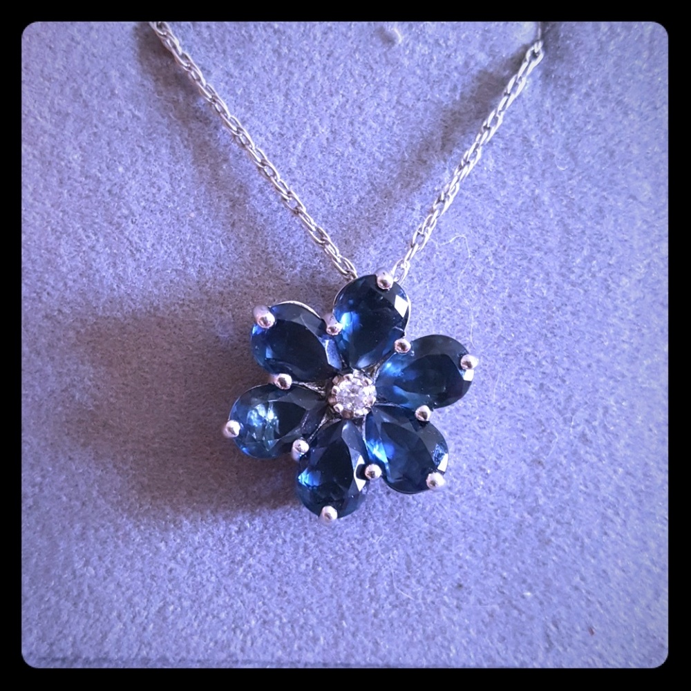 Lab Blue sapphire/white flower necklace.
