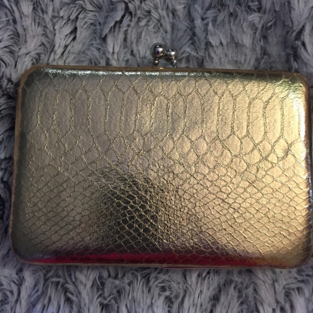 Gold snakeskin clutch