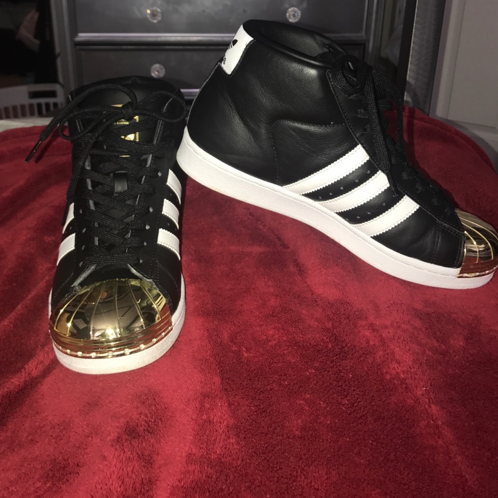 Gold metal toe high top Adidas Superstar