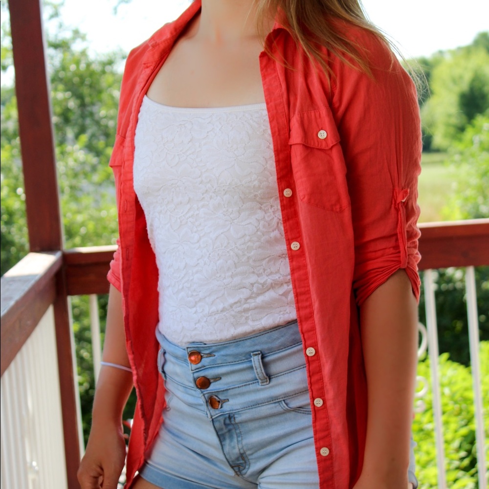 Cute orangish red button up top
