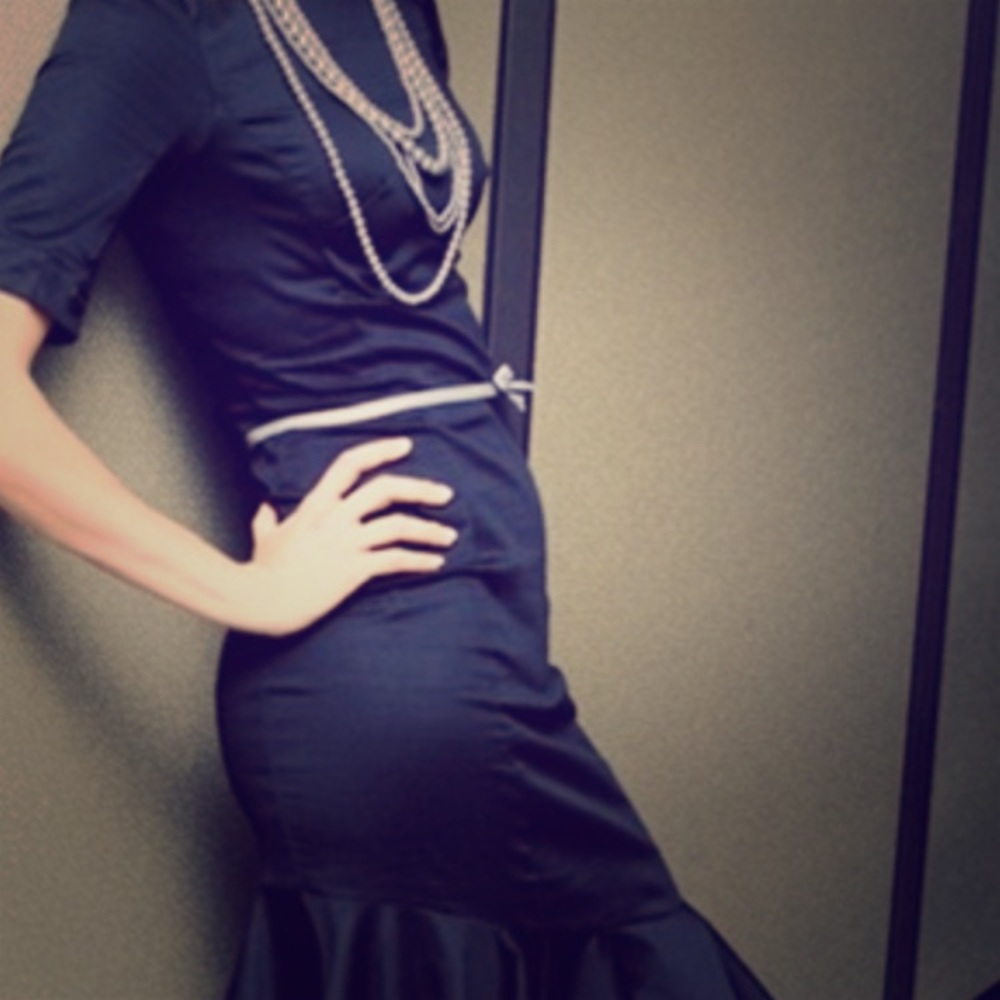 Boat neck flared black dress