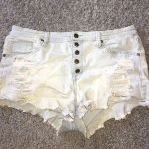 High waisted stretchy shorts with rips size 16/33
