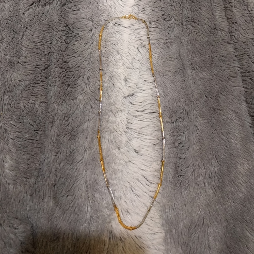 Necklace.  Gold and silver color neck chain