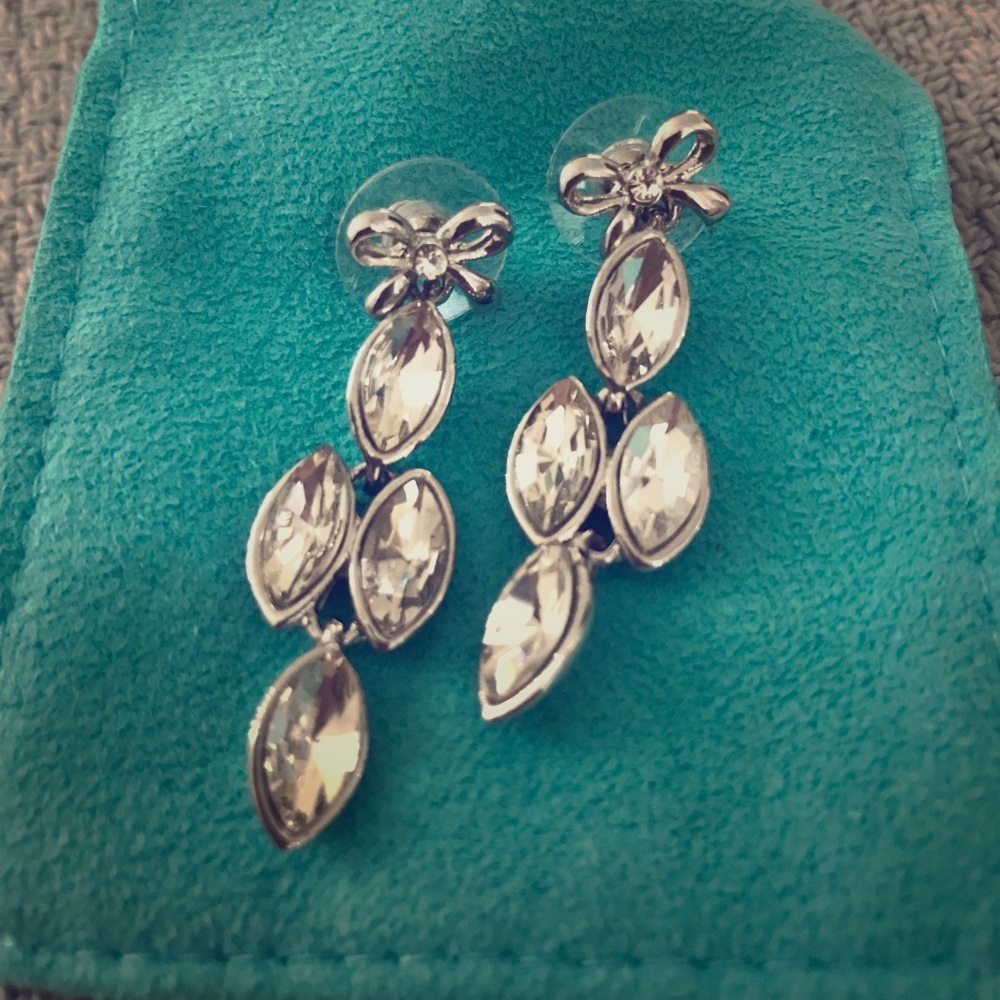 Silver bow chandelier earrings
