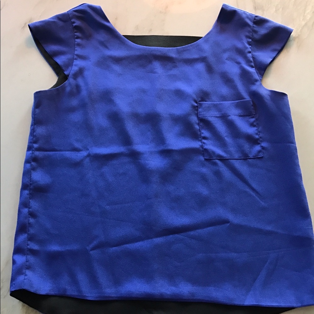 Blue "Just Ginger" shirt with awesome back!