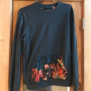 On the Byas Crewneck sweatshirt