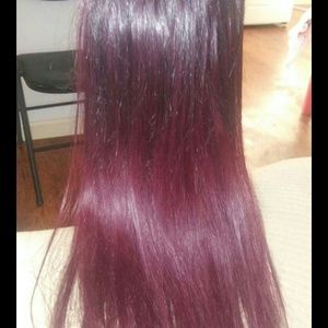 One piece burgandy clip in hair extension.