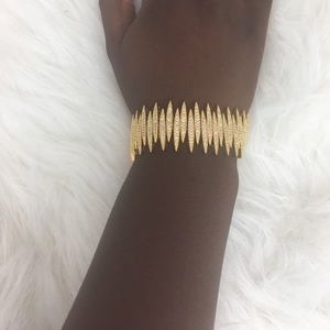 Gold Colored Bracelet with Encrusted Diamonds