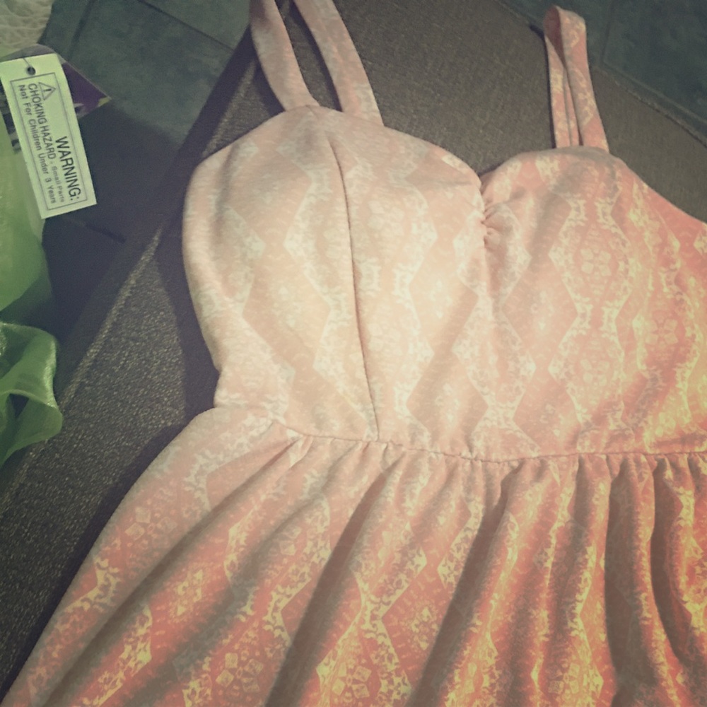 XL pink spring dress with white detail.