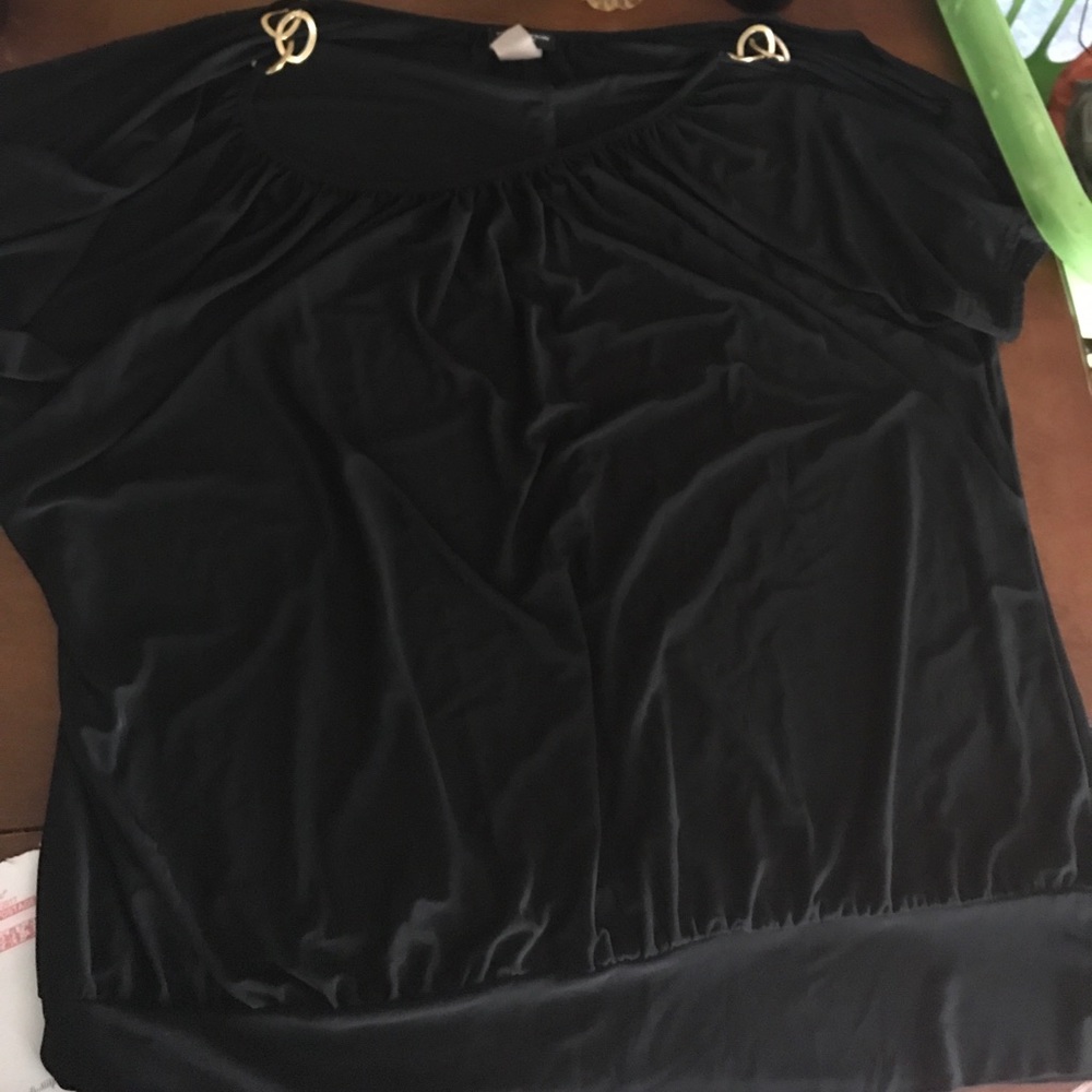 Black shirt with gold chain accents