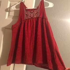 A reddish patterned blouse