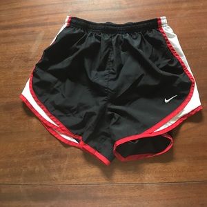 Black with red Nike running shorts