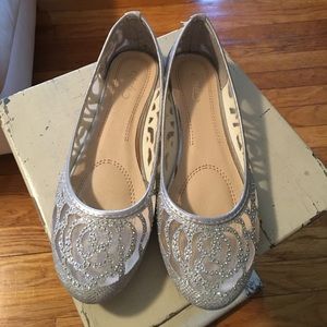 Shiny silver ballerina shoes