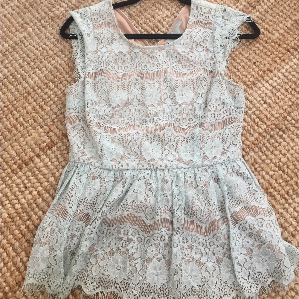 Light blue lace top on top of nude lining