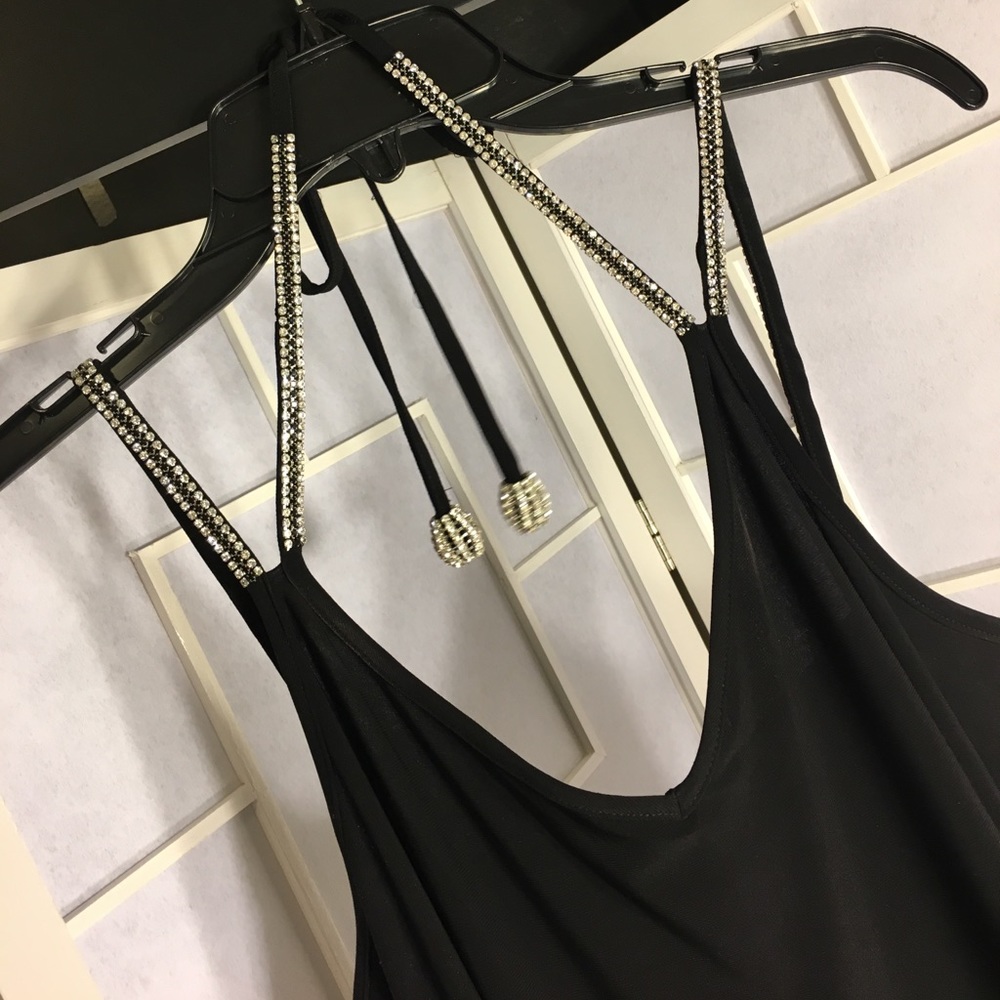 Black cocktail dress with diamond accents