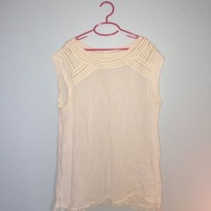 Sleeveless cream top