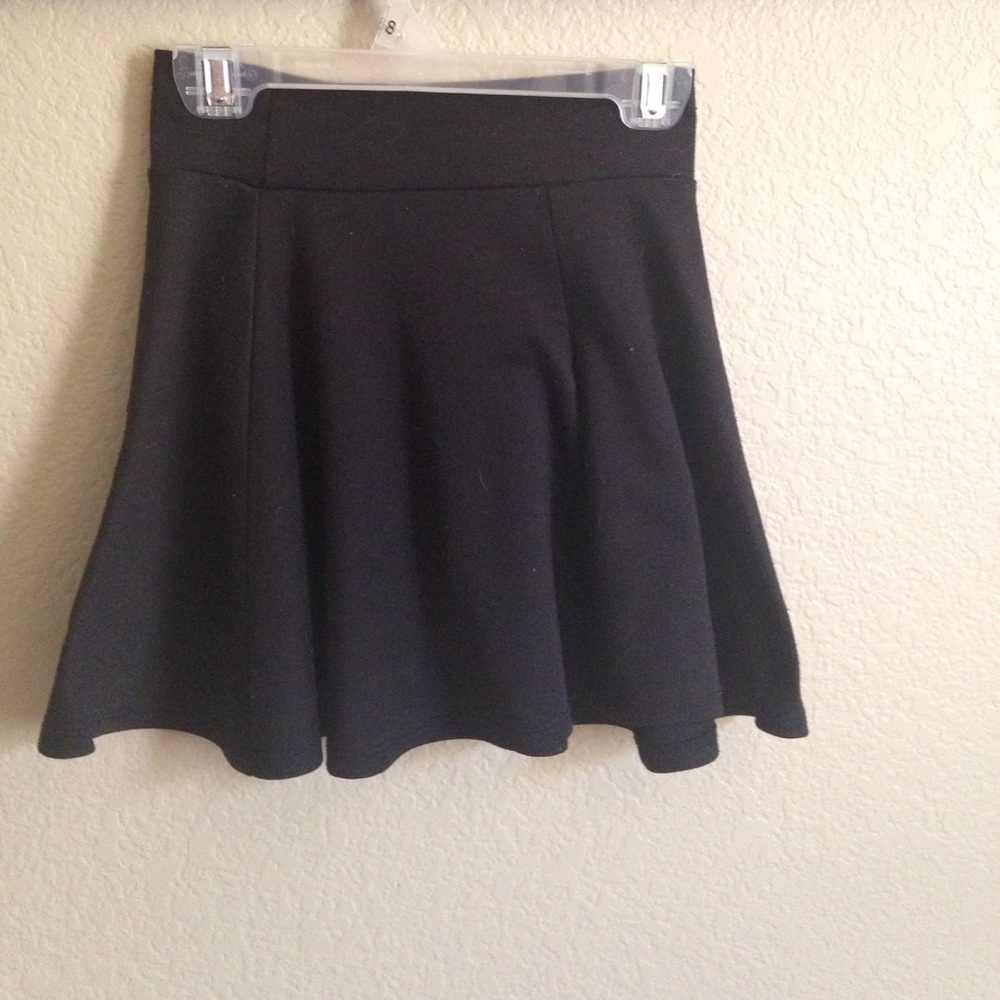 Plain black girls skater skirt.