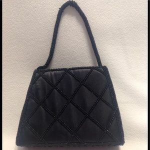 Formal black beaded isosceles shaped purse