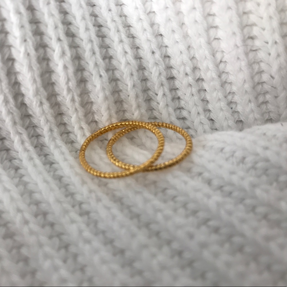 two gold midi band rings