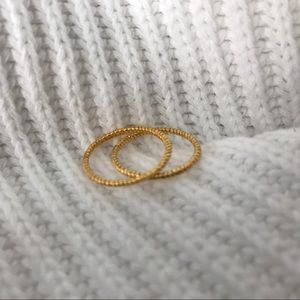 two gold midi band rings