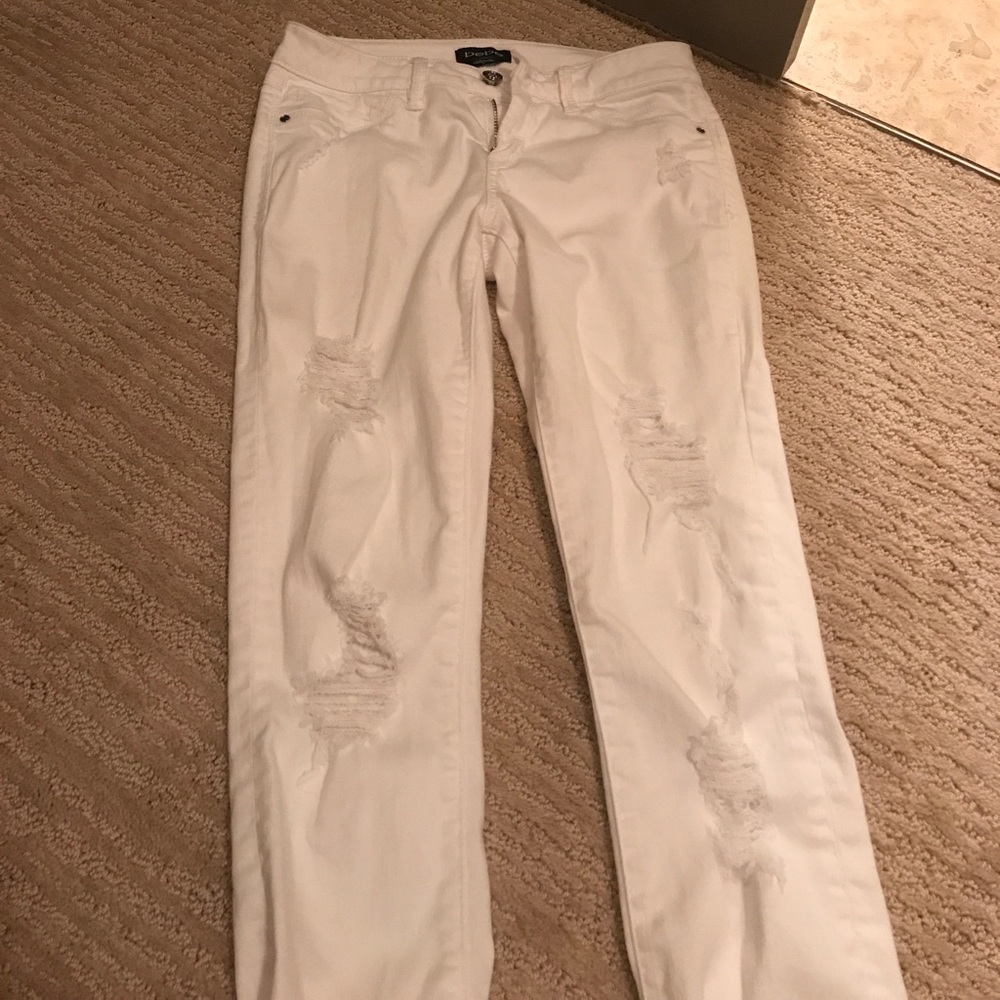 Bebe frayed skinny jeans