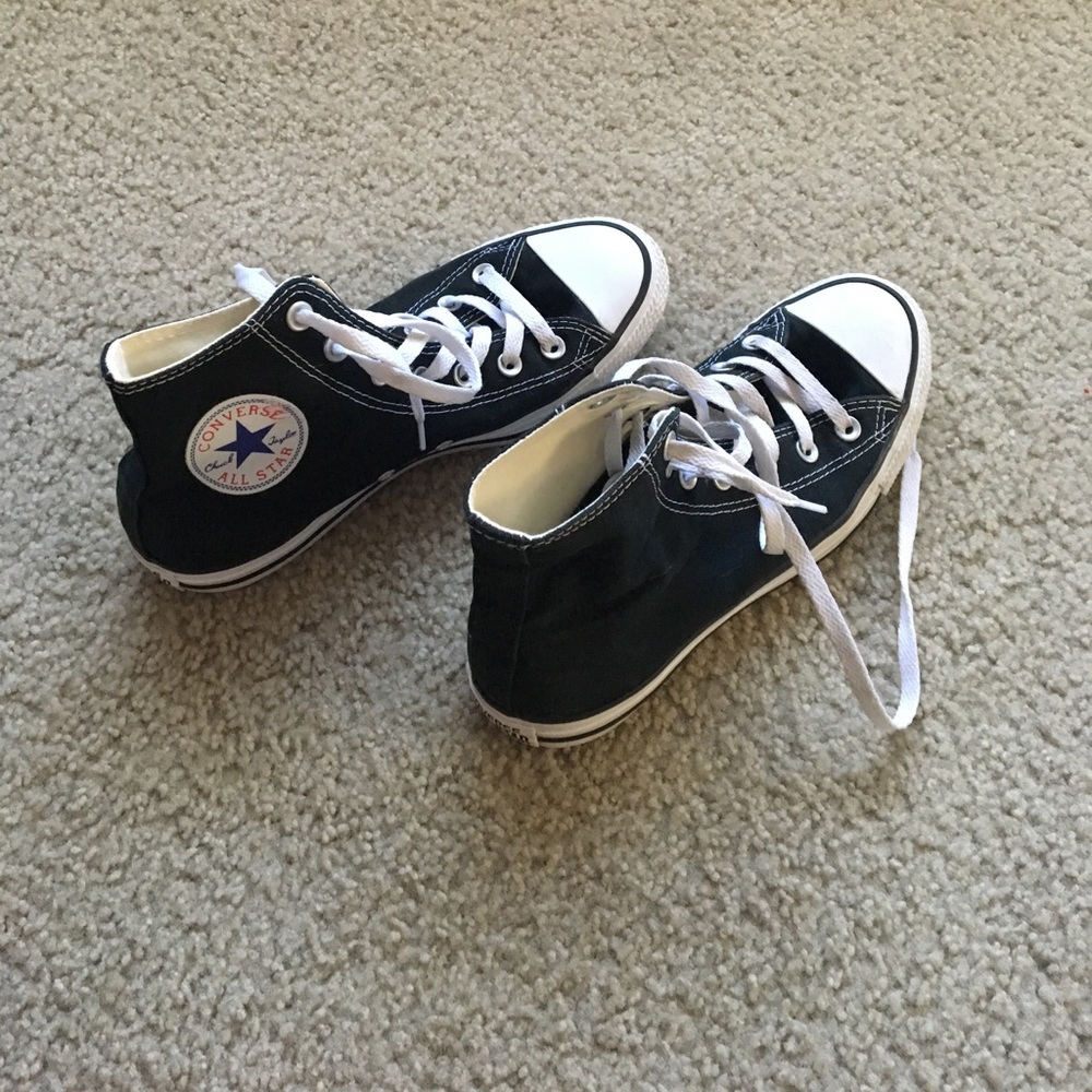 Black and white high top converse