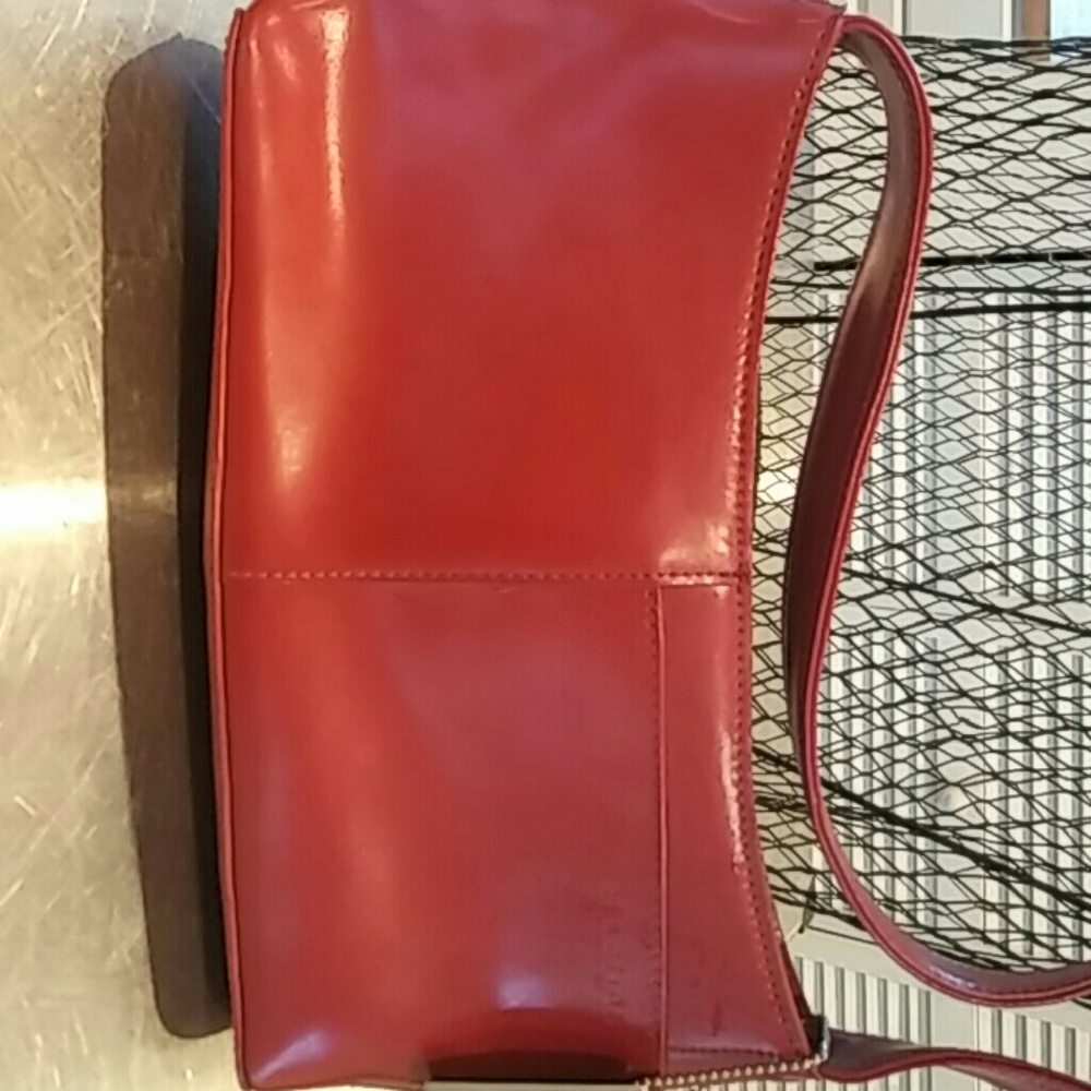Sleek red hand bag
