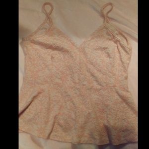 Orange and nude peplum top