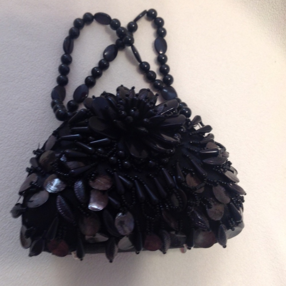 Expressions NYC, rounded beaded, magnetic clutch